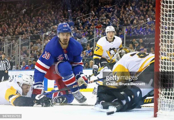 Chris Kreider of the New York Rangers scores the game winning goal against the Pittsburgh Penguins during the third period at Madison Square Garden...
