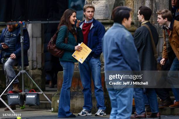 Actor Ed McVey, as Prince William and actress Meg Bellamy, who plays Kate Middleton are seen during filming for the next season of The Crown in St...