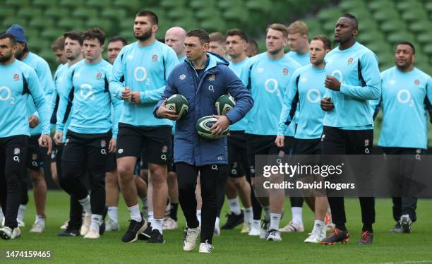 Kevin Sinfield, the England defence coach, walks with the team during the England captain's run at the Aviva Stadium on March 17, 2023 in Dublin,...