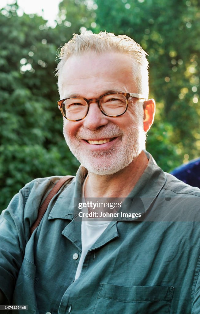 Portrait of smiling man looking at camera