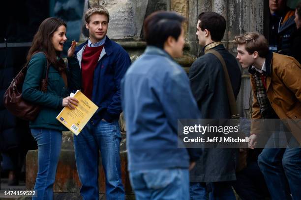 Actor Ed McVey, as Prince William and actress Meg Bellamy, who plays Kate Middleton are seen during filming for the next season of The Crown in St...