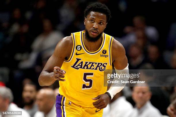 Malik Beasley of the Los Angeles Lakers reacts after scoring a three point basket during the first quarter of an NBA game at Smoothie King Center on...