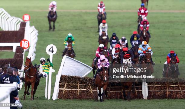 Mark Walsh on board Corbetts Cross collides with the rails as Harry Cobden on board Stay Away Fay jumps the last on their way to winning the Albert...