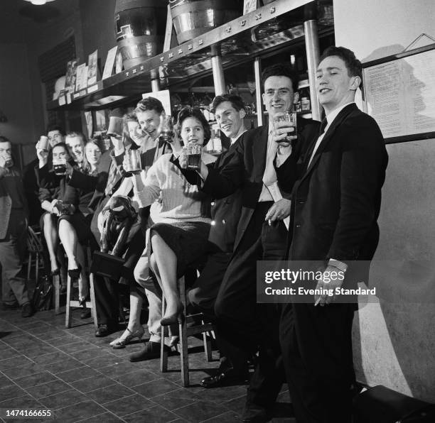 London School of Economics students drinking at the Three Tuns Bar, London, March 21st, 1960.