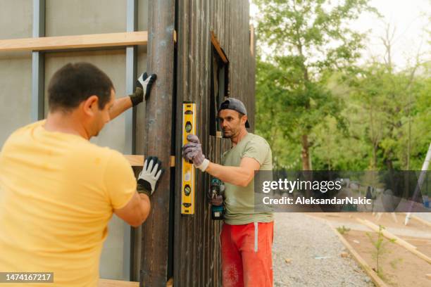 constructing the wooden facade - floorboard bildbanksfoton och bilder