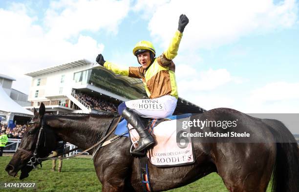 Paul Townend on board Galopin Des Champs celebrate after winning the Boodles Cheltenham Gold Cup Chase during day four of the Cheltenham Festival...