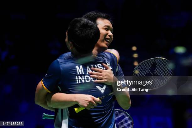 Mohammad Ahsan and Hendra Setiawan of Indonesia celebrate the victory in the Men's Doubles quarter finals match against Liu Yuchen and Ou Xuanyi of...