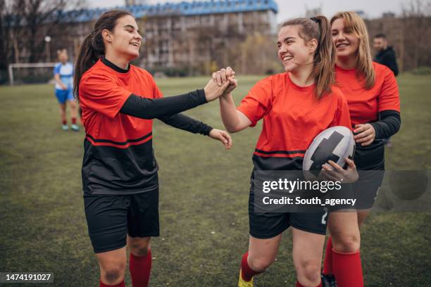 female rugby players - rugby match stock pictures, royalty-free photos & images
