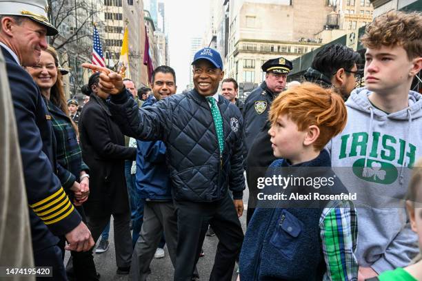 New York City Mayor Eric Adams points to FDNY Fire Chief John J. Hodgens in the St. Patrick’s Day parade on March 17, 2023 in New York City. The...