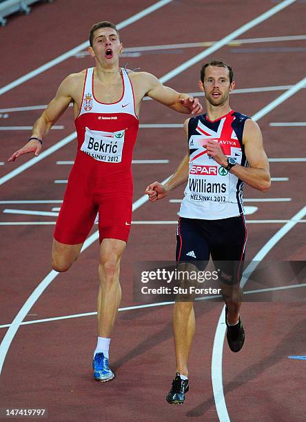 Rhys Williams of Great Britain wins gold ahead of Emir Bekric of Serbia in the Men's 400 Metres Hurdles Final during day three of the 21st European...