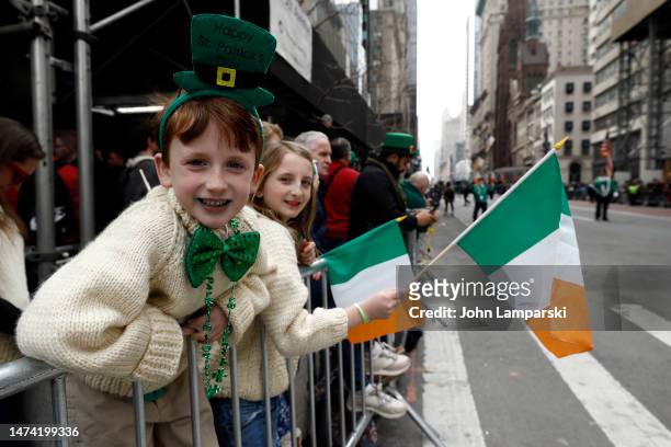 Spectators attend the St. Patrick's Day Parade up 5th Ave. On March 17, 2023 in New York City.
