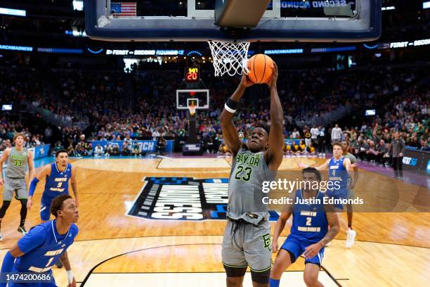 Jonathan Tchamwa Tchatchoua of the Baylor Bears dunks the ball during the first half against the UC Santa Barbara Gauchos in the first round of the...