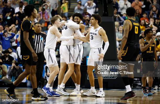 The Xavier Musketeers players celebrate against Kennesaw State Owls during the second half in the first round of the NCAA Men's Basketball Tournament...