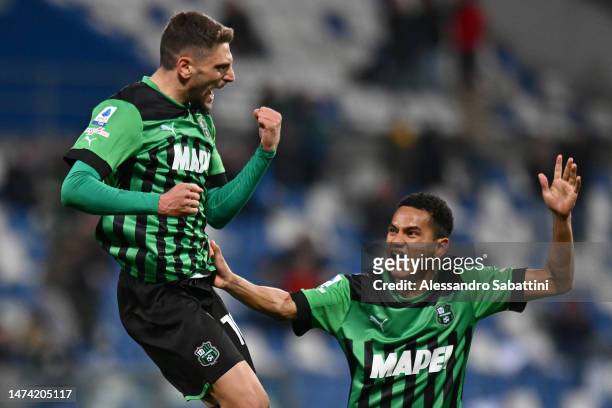 Domenico Berardi of US Sassuolo celebrates with Rogerio after scoring the team's first goal during the Serie A match between US Sassuolo and Spezia...