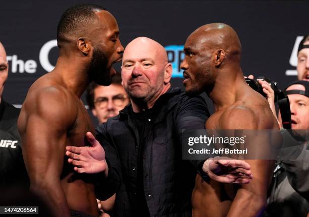 Opponents Leon Edwards of Jamaica and Kamaru Usman of Nigeria face off during the UFC 286 ceremonial weigh-in at The O2 Arena on March 17, 2023 in...