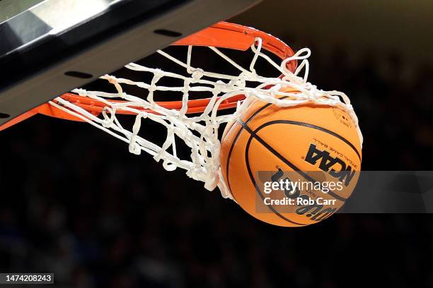 The ball goes through the net in the second half of the game between the Virginia Commonwealth Rams and the St. Mary's Gaels during the first round...