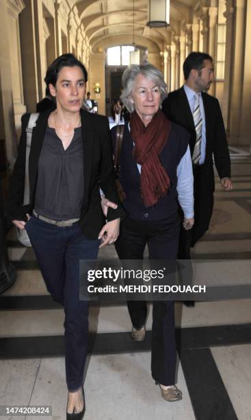 Claude Erignac's widow Dominique Erignac , her daughter Marie-Christophine and son Charles Antoine leave the Paris courthouse on May 24, 2011 in...