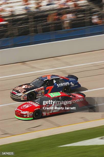 Jeremy Mayfield, driver of the Evernham Motorsports Dodge Intrepid R/T and Casey Atwood, driver of the Ultra Motorsports Dodge Intrepid R/T, race...