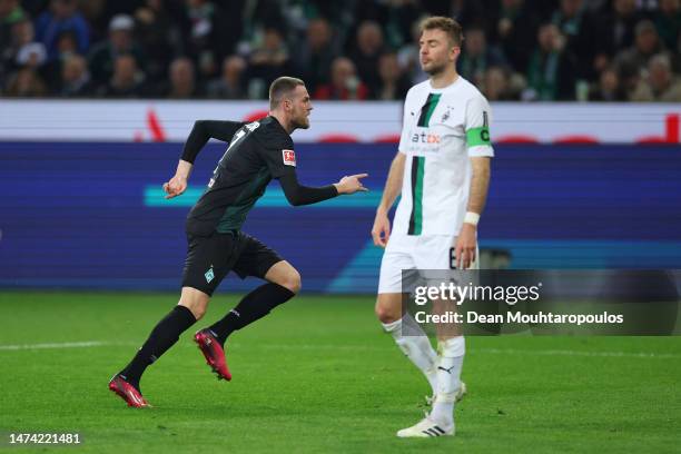 Marvin Ducksch of SV Werder Bremen celebrates after scoring the team's second goal during the Bundesliga match between Borussia Mönchengladbach and...