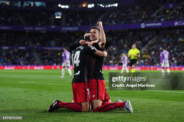 Gorka Guruzeta of Athletic Club celebrates with teammates after scoring the team's second goal during the LaLiga Santander match between Real...