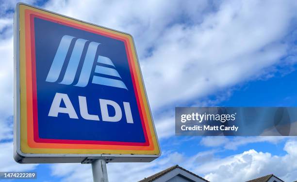 The Aldi logo is displayed above the door to a branch of the supermarket retailer Aldi on March 05, 2023 in Bristol, England. Aldi is a German...