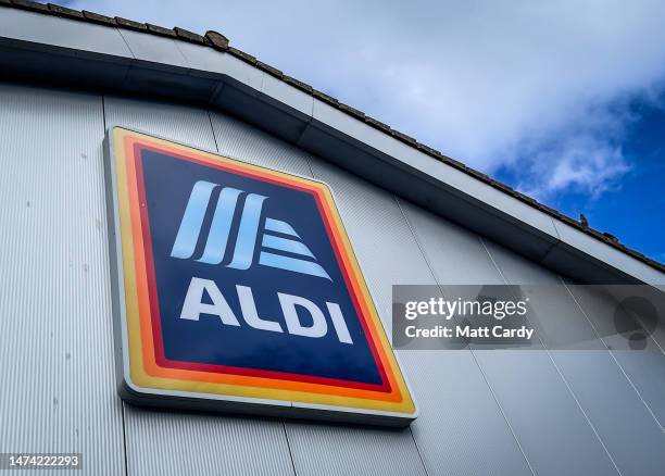 The Aldi logo is displayed above the door to a branch of the supermarket retailer Aldi on March 05, 2023 in Bristol, England. Aldi is a German...