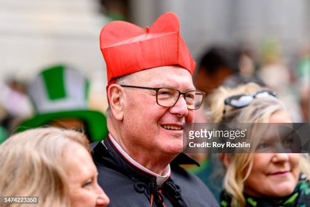 Archbishop of New York, Cardinal Timothy Dolan greets people during the 2023 New York City St. Patrick's Day parade on March 17, 2023 in New York...