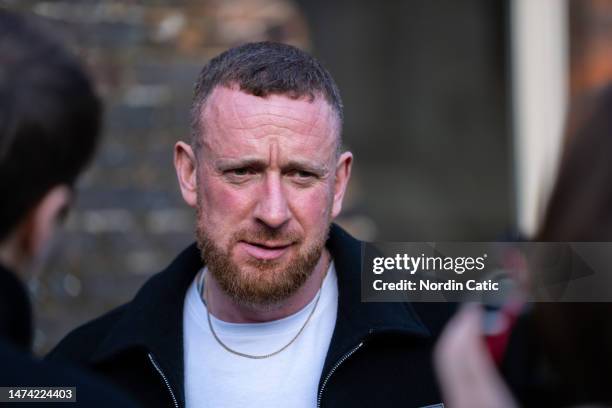 Sir Bradley Wiggins looks on during his visit to The Cambridge Union on March 17, 2023 in Cambridge, England.