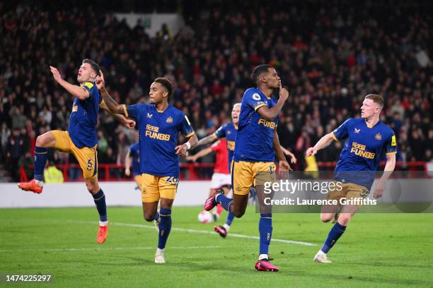 Alexander Isak of Newcastle United scores the team's second goal from a penalty kick during the Premier League match between Nottingham Forest and...