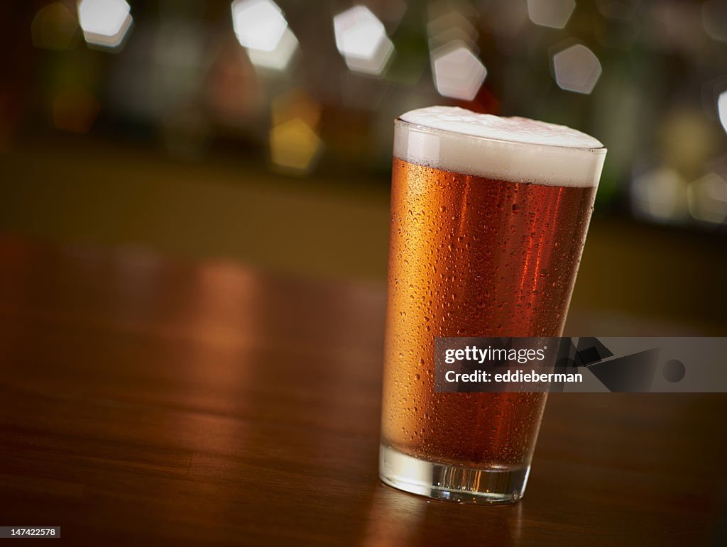 Pint of Beer On a Bar