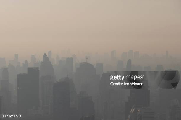 pollution pm 2.5 dust in city. - inquinamento dellaria foto e immagini stock