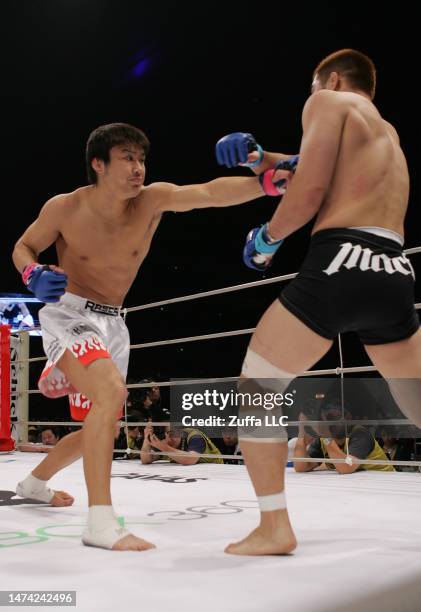 Takanori Gomi punches Hayato Sakurai in the Pride Grand Prix finals inside Saitama Super Arena on December 31, 2005 in Saitama, Japan.