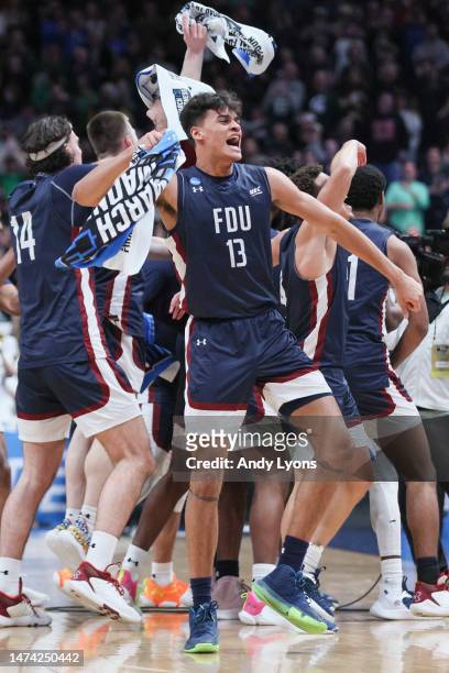 Jo'el Emanuel of the Fairleigh Dickinson Knights celebrates after beating the Purdue Boilermakers 63-58 in the first round of the NCAA Men's...