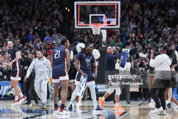 The Fairleigh Dickinson Knights celebrate after beating the Purdue Boilermakers 63-58 in the first round of the NCAA Men's Basketball Tournament at...