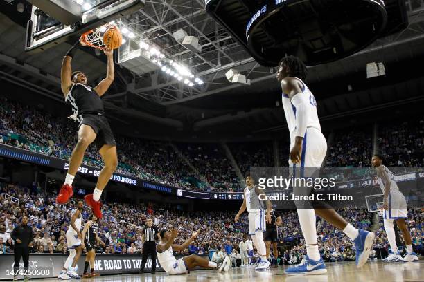 Ed Croswell of the Providence Friars dunks the ball during the second half against the Kentucky Wildcats in the first round of the NCAA Men's...