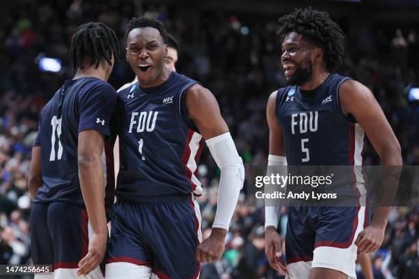 Joe Munden Jr. #1 of the Fairleigh Dickinson Knights reacts in the second half of a game against the Purdue Boilermakers in the first round of the...