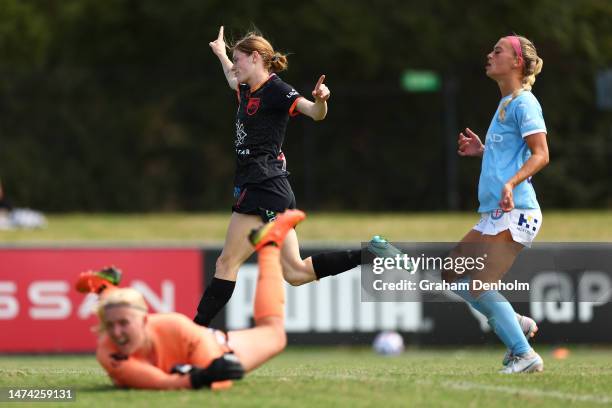 Cortnee Vine of Sydney FC celebrates scoring a goal as Sally James of Melbourne City looks on during the round 18 A-League Women's match between...