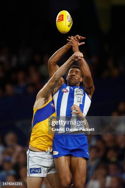 Aiden Bonar of the Kangaroos and Callum Jamieson of the Eagles contest the ball during the round one AFL match between North Melbourne Kangaroos and...