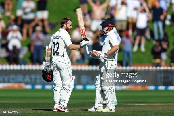 Kane Williamson of New Zealand celebrates his double century while Henry Nicholls looks on during day two of the Second Test Match between New...
