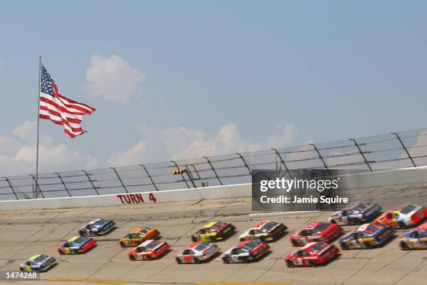 Jimmie Johnson, Jeff Gordon and Rusty Wallace lead the field through the 4th turn for the start of the NASCAR Winston Cup EA Sports 500 at Talladega...