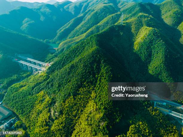high angle view of cars moving on highway tunnels - east asia stock pictures, royalty-free photos & images