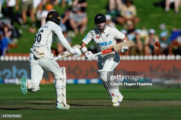 Henry Nicholls and Tom Blundell of New Zealand make a run during day two of the Second Test Match between New Zealand and Sri Lanka at Basin Reserve...