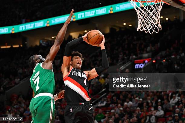 Matisse Thybulle of the Portland Trail Blazers drives to the basket against Jaylen Brown of the Boston Celtics during the second quarter at the Moda...