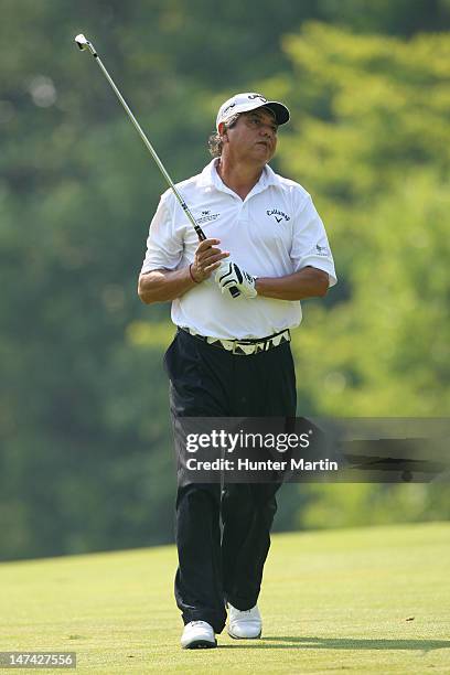 Eduardo Romero of Argentina watches his second shot on the second hole during the second round of the Constellation SENIOR PLAYERS Championship at...