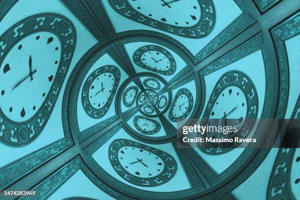 endless time spiral in blue tone - classic analog clock stock pictures, royalty-free photos & images