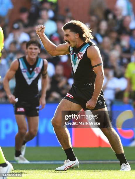 Lachie Jones of Port Adelaide celebrates a goal during the round one AFL match between Port Adelaide Power and Brisbane Lions at Adelaide Oval, on...