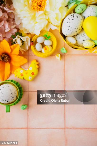 flowers, toys, eggs in a bucket, in a mug and in a nest. - easter sunday stock pictures, royalty-free photos & images