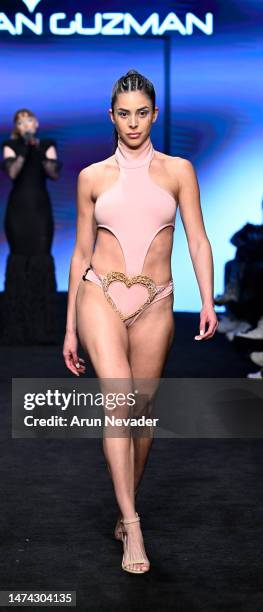 Model walks the runway wearing Jonathan Guzman during Los Angeles Fashion Week Powered by Art Hearts Fashion at The Majestic Downtown on March 17,...