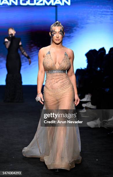 Model walks the runway wearing Jonathan Guzman during Los Angeles Fashion Week Powered by Art Hearts Fashion at The Majestic Downtown on March 17,...