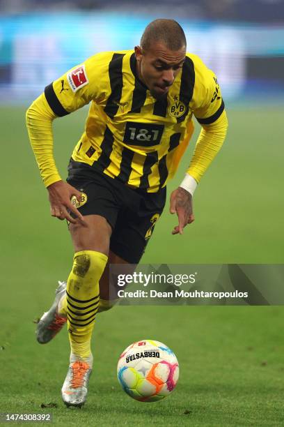 Donyell Malen of Borussia Dortmund in action during the Bundesliga match between FC Schalke 04 and Borussia Dortmund at Veltins-Arena on March 11,...